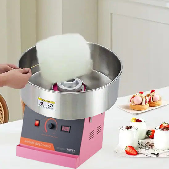 machine barbe a papa rose pour le festin